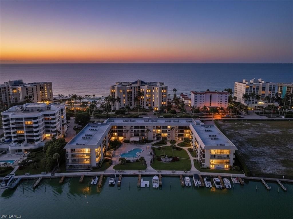 Photo of 3200 Gulf Shore BLVD N #105, NAPLES, FL 34103 (MLS # 225081458)