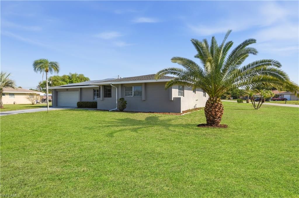 Photo of 1405 Archer ST, LEHIGH ACRES, FL 33936 (MLS # 226013394)