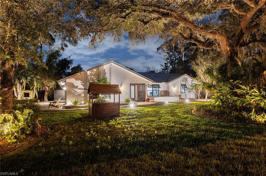 *Luxury Estate Living on Over an Acre with Gulf Access through Hendry Creek*

A rare opportunity to own a private Southwest Florida estate home on over an acre, offering direct Gulf access, and high-end, thoughtful upgrades, all in an in-town location. This Hendry Creek gem delivers the perfect balance of space, privacy, and convenience that is seldom found.

Beyond the electric gated entrance, you'll be greeted by an expansive property with mature landscaping, a covered boat ramp, large storage shed, a composite deck with a fish cleaning station, and a fire pit for evening gatherings under the stars. As you enter the home,  you'll notice this fully remodeled home is complete with refined finishes and thoughtful design throughout. From custom cabinetry, upgraded trim, tile flooring, and a seamless floor plan that creates an ideal atmosphere for both entertaining and relaxation. The chef’s kitchen is truly the heart of the home, with custom kitchen cabinetry (with soft-close drawers), high-end quartz countertops, and stainless steel appliances. The split-bedroom layout provides privacy, with the master suite featuring sliding glass doors giving direct access to the lanai, a walk-in closet, and huge bathroom with a built-in vanity. With one guest room offering its own ensuite bathroom and walk-in closet, it's ideal as a guest suite, 2nd primary suite, or for multi-generational living. Multiple sliding glass doors lead to the large, wrap-around lanai for the ultimate indoor-outdoor living experience. The custom in-ground, salt-water pool & spa is unlike any other, creating an intimate space to relax and unwind. 

Major improvements include a newer roof (2020), two newer HVAC systems (2022/2023), impact-rated windows and doors, newer garage and front doors, newer water heater (2024), newer electric gate, and all new equipment for the heated saltwater pool and spa for peace of mind and long-term value. Located in the highly desirable Hendry Creek area, this home offers a peaceful, secluded feel while being just minutes from shopping, dining, beaches, and major conveniences. Acreage, Gulf access, luxury upgrades, and value - this home truly checks every box.