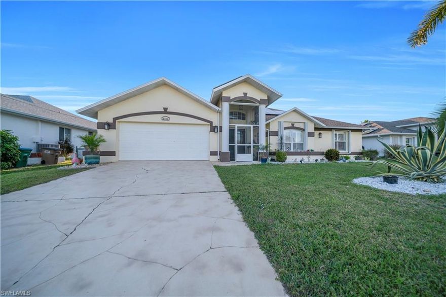 Located in the desirable SW Cape Coral Pelican area, this home offers a functional open floor plan with 3 bedrooms, 2 baths, designed for comfortable everyday living. The property is surrounded by well-regarded schools and neighboring multi-million dollar homes, reflecting the strong long-term value and appeal of the area.

Recent improvements include a new roof and paid off solar panels included in the sale, providing long-term energy efficiency and utility savings. The home features a solar-heated saltwater pool and spa, surrounded by a screened lanai and brick paver decking, ideal for outdoor enjoyment year round. 

Additional exterior features include accordion-style hurricane shutters throughout, a fenced yard, and well-maintained landscaping that enhances curb appeal.  Inside, the home offers an open living and dining area with natural flow into the kitchen providing ample counter space and stainless steel appliances. The home features a functional split-bedroom layout, with the primary bedroom and one additional bedroom offering sliding glass door access to the lanai. The primary suite is privately located on the opposite side of the home and includes a double-vanity and practical layout. Conveniently located near Cape Harbour Marina, waterfront dining, shopping, and local amenities. With its desirable location and major upgrades already completed, this SW Cape Coral home is ready for its next owner to step in and make it their own.
