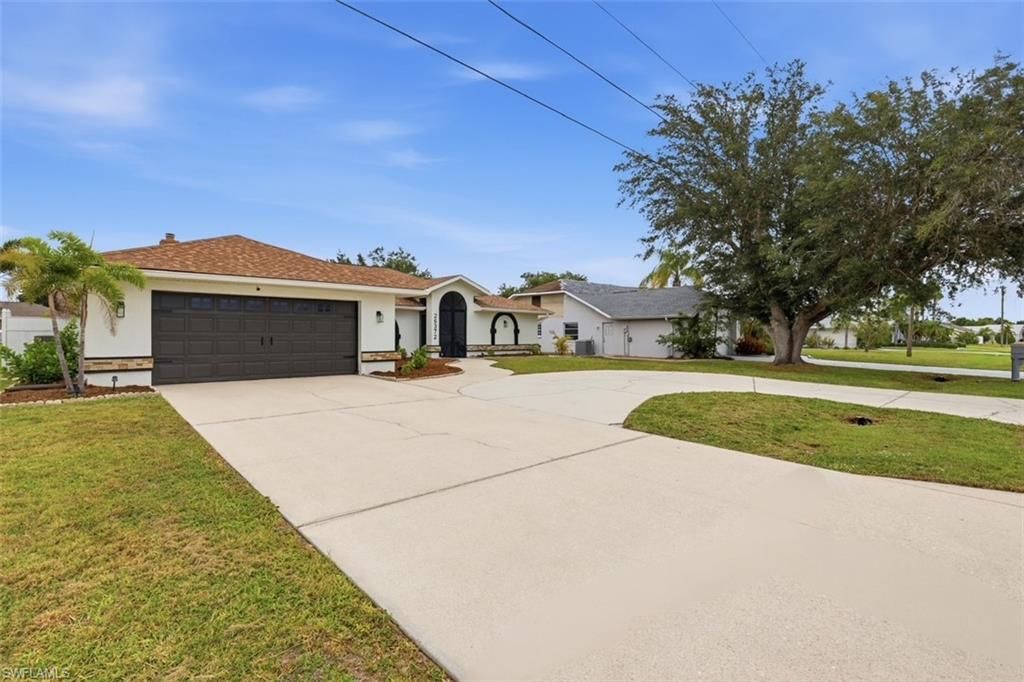 Photo of 26372 Asuncion DR, PUNTA GORDA, FL 33983 (MLS # 226019821)