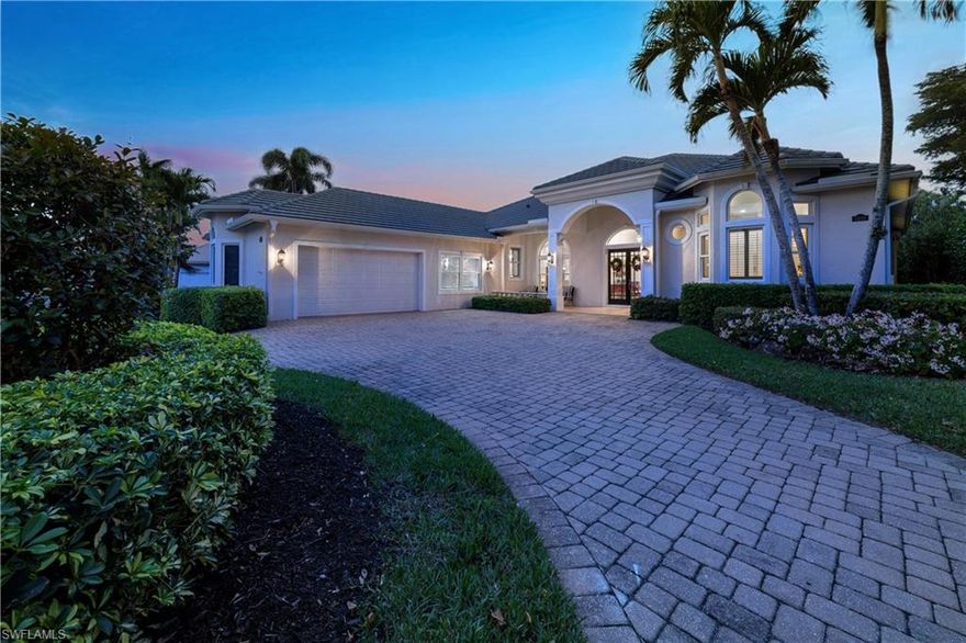 Custom built estate home with gorgeous craftsman quality millwork and windows to the outdoor living space. Recent kitchen renovation with massive center island, custom hood over stovetop and 2 GE Cafe wall ovens including double door wall oven, GE induction stove top, GE Cafe refrigerator that provides filtered hot and cold water and cubed ice.  There is also a kitchen Aid under counter microwave and Bosch dishwasher.  The n 2023 pool renovation includes new Travertine pool decking, new pool equipment, resurfacing, new tile as well as larger and more steps and seats in the pool.  Large primary suite with double door access to pool and spa and 2 large walk-in closets.  Garage is currently functioning as a 2 car with 3rd bay used as office space with separate temperature control and custom storage closet.  Can be converted to full 3 car garage.  Complete storm protection including electric shutters across covered lanai space and front entry area as well as impact windows on remaining openings.  Enjoy all The Club At The Strand has to offer including fitness, tennis, pickleball, bocce ball croquet and of course golf if you wish to upgrade to that membership. A true gem in a fantastic community, this home is not to be missed.