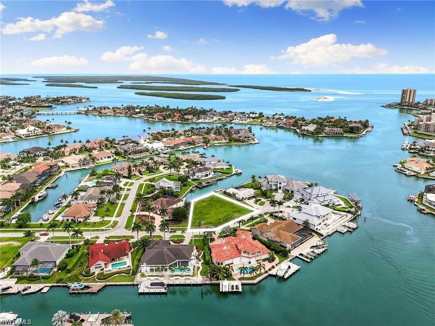 Exceptional opportunity to acquire a premier waterfront homesite in the highly desirable Mini-Estates area of Marco Island. Situated on a quiet cul-de-sac, this oversized parcel offers direct boating a with quick access to the Gulf of America and the Ten Thousand Islands. Building design available with ten car garageProposed Luxury Residence Concept (Available to Buyer)
A modern coastal two-story estate designed to maximize indoor-outdoor living, waterfront views, and resort-style amenities.Approx. 6,605 SF under roof, two-story residence with elevator,, 10-Car Garage (ideal for car collectors, lifts, and climate-controlled storage) Dedicated Wellness Area.