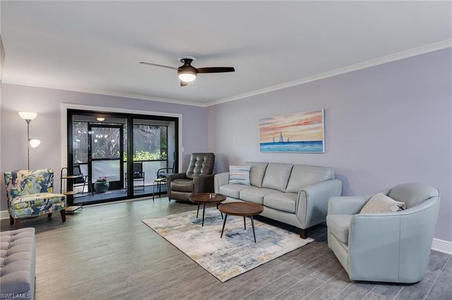 Welcome to this beautifully furnished, turnkey, condo! This property boasts 2 bedrooms, 2 bathrooms complimented by tastefully chosen furnishings.  The porcelain tile flooring, crown molding, quartz countertops throughout  as well as the updated kitchen and bathrooms add a touch of elegance. With a tankless water tank, you'll never run out of hot water and the sleep adjust settings on all beds - perfect for hosting guests.  Major upgrades include a newer AC System, new electrical panel, new storm-impacted doors and windows offering peace of mind and energy efficient.  The beautiful furnishings and wooded view with lush foliage create a serene atmosphere, perfect for unwinding after a long day. Step outside onto one of the two private patio lanais and soak in the Florida sunshine and with the beaches just a short drive away, you'll have endless opportunities for fun in the sun. Enjoy a game of shuffleboard, pickleball, or tennis on the courts, or take a short drive to prime shopping and restaurants. Pet friendly.  Conveniently located just 15 minutes from the airport. Don't miss out on this incredible opportunity to own a piece of paradise in Fort Myers!  Perfect as a rental investment, seasonal retreat, or full time residence.  Schedule your private showing today!