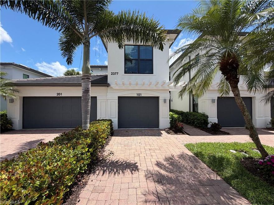 COVETED Pelican Marsh ANNUAL!  Wonderful first floor Ravenna Community 3-bedroom, 2 bath end unit with garage available unfurnished.  Enjoy extremely peaceful LONG Lake and multiple fairways views.  Carpet in bedrooms!  Open floor plan, this home lives very comfortably.  Light and Bright with Side windows on the Southern side.  Double Gate with roving patrols so very quiet.  Community pool just steps away!  ALSO, The excellent Full-Service Community Center, offering a spa, sauna and state of the art fitness center called the “Inspiration Studio.  Very active Tennis and Pickleball programs!  Bocce Ball League. Courtside Restaurant, and walking paths throughout the community with its Four Access points to head any direction you want to be in town.  Very Close to everything North Naples!  Mercato - 5 min.  Vanderbilt Shoppes at Galleria- 3 min.  Publix and Trader Joe's 5-6 min.  Chek it!!