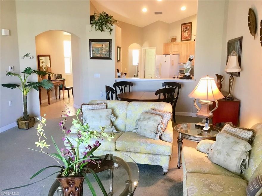 This second floor, 3 bedroom, 2.5 bath carriage home shows beautifully and features solid surface counter tops with moulded sink and wood cabinetry in the kitchen, neutral tile, berber carpeting and a convenient location within the community, just steps from the fantastic community center ammenities.  Enjoy the resort style pool, tennis courts, billiards and experience a great work out in the state of the art fitness center.  Live the Dream in Bridgewater Bay, Naples Florida !