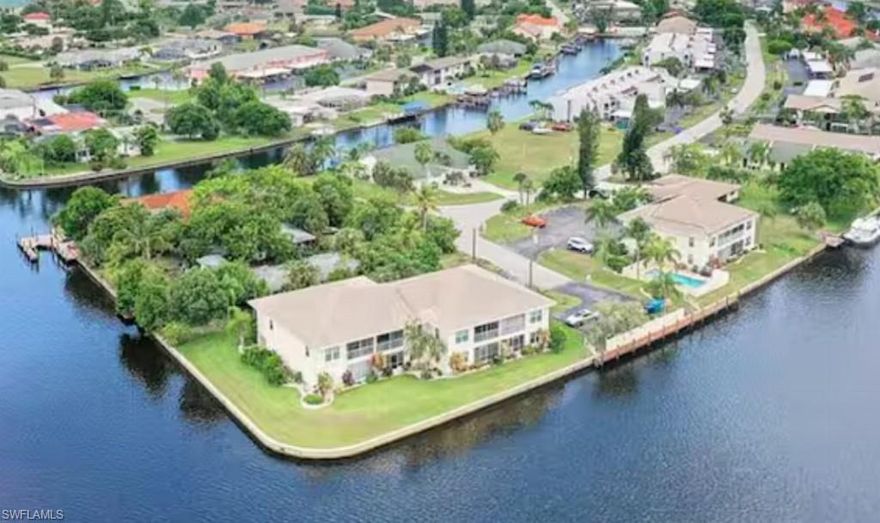 Welcome to 4500 SE 5th Pl Unit #105, a beautifully renovated, turnkey 2-bedroom, 2-bath first-floor condo in one of Cape Coral’s most desirable waterfront communities. Enjoy peaceful canal views with direct Gulf access just minutes away.

This unit offers rare peace of mind for a waterfront condo:

-Two-week minimum rentals allowed, HOA background check required
-Pets allowed (2 max / per association)
-Flood Insurance Covered by HOA
-Sellers are flexible on timing and showings
-Direct Gulf access (approx. 20 minutes to open water)
-First-come, first-serve boat dock with no waitlist (dock being replaced this summer)

- Did NOT flood during Hurricane Ian
- New community roof installed May 2022
- Condo association maintains fully funded reserves
- No current or pending special assessments
- Eligible for conventional financing (buyer to verify)
Inside, you’ll find a bright, open layout with luxury white tile throughout, a fully remodeled kitchen with quartz countertops, stainless steel appliances, and new cabinetry, plus updated bathrooms with modern finishes and fixtures.

Relax on your private screened lanai overlooking the water or take a swim in the community pool surrounded by palms. Conveniently located near dining, shopping, and boating, this property is ideal as a full-time residence, seasonal getaway, or income-producing rental.