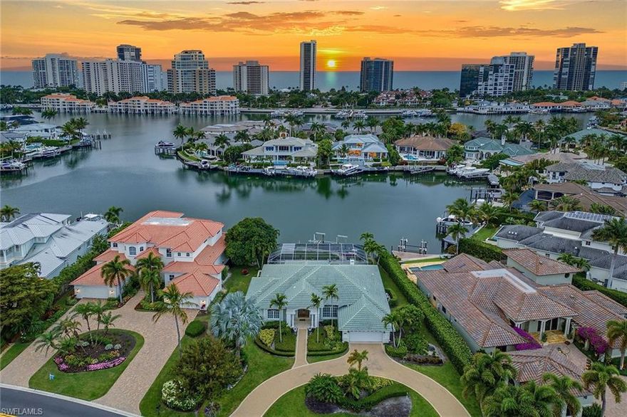 Prime opportunity on Venetian Bay in coveted Park Shore. Situated on an oversized, nearly half-acre waterfront lot, this exceptional property captures long, sweeping western views over Venetian Bay—offering breathtaking sunsets and an unparalleled coastal backdrop, making it one of Park Shore’s most desirable waterfront settings. The existing residence features 3 bedrooms plus a study, 3.5 baths, and a bright, open layout complemented by neutral finishes throughout. Designed to maximize natural light and showcase the stunning water views, the home offers comfortable coastal living with strong seasonal rental history—making it ideal for immediate enjoyment or income potential. For those seeking to create a custom waterfront estate, this property presents an extraordinary canvas. Build your dream bayfront residence, with plans available for a 6,000+ square foot luxury home, perfectly positioned to take full advantage of the expansive lot and panoramic vistas. Boating enthusiasts will appreciate the ample water-frontage, along with seamless access to the Gulf. Additional highlights include eligibility for membership to the exclusive Park Shore Beach Park and close proximity to Venetian Village, Waterside Shops, and the world-class dining, shopping, and entertainment of Downtown Naples. Whether you envision renovating, investing, or building a legacy waterfront estate, this is a rare and compelling opportunity in one of Naples’ most sought-after locations.