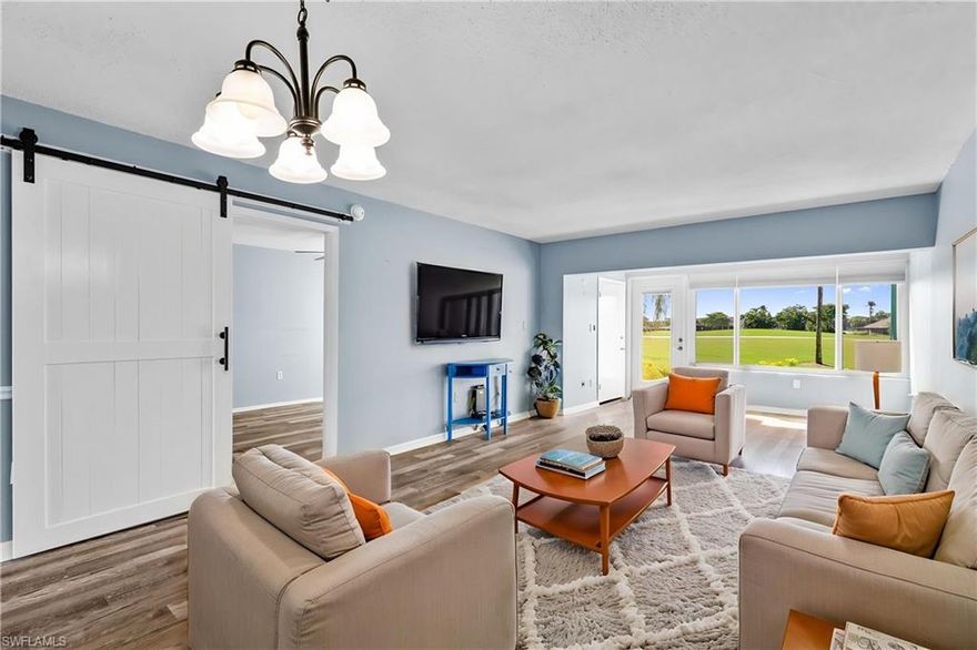 FULLY UPDATED – BUNDLED GOLF (NO GREEN FEES) – GOLF VIEW! This beautifully renovated 1-bedroom, 1-bath condo with a unique middle changing room featuring dual sinks offers modern upgrades, added peace of mind, and an unbeatable lifestyle in Seven Lakes. Recent improvements include new flooring, fresh paint, new appliances, a fully remodeled kitchen, and a tastefully updated bathroom—creating a clean, move-in-ready space with contemporary finishes throughout. A major structural upgrade includes the entire rear wall of the main living area being newly rebuilt, enhancing both quality and appeal. The home also features hurricane-impact windows throughout the entire unit, providing added protection, energy efficiency, and peace of mind. This building is also not located in a flood zone, a valuable advantage within the community. Enjoy relaxing golf course views overlooking the 1st hole, offering a serene and scenic backdrop right from your home. Located in the highly desirable Seven Lakes community, residents enjoy bundled golf with NO green fees or membership fees, along with resort-style amenities including six swimming pools, a newly updated fitness facility, tennis and pickleball courts, and a vibrant, active social calendar. With convenient access to shopping, dining, and Southwest Florida’s beautiful beaches, this property is ideal for year-round living, a seasonal retreat, or a smart investment opportunity.THIS PROPERTY QUALIFIES FOR A 1% LENDER INCENTIVE IF USING PREFERRED LENDER, INQUIRE FOR MORE DETAILS** One or more photo(s) has been virtually staged, AI generated, or rendered.