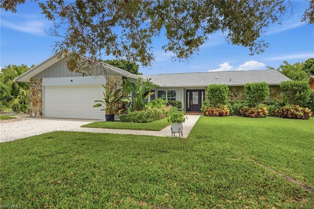 Photo of 425 Pine Lake DR, NAPLES, FL 34112 (MLS # 226017373)