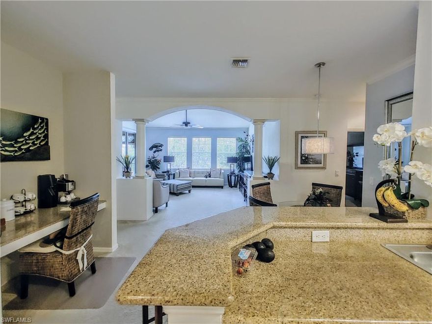 LIGHT and BRIGHT - AMAZING very well kept condo with attached 2-car tandem GARAGE. EVERYTHING is INCL. in the low HOA fees. The Owner pays only for electricity. This amazing unit boasts a bright and welcoming atmosphere with tons of natural light flowing through its spacious living area. The tiled BACK SPLASH in the kitchen, with beautiful updated cabinets, gives a special look. Both bathrooms come with a contemporary bidet attachment. **Stainless steel appliances** The AC was replaced in 2020 - NEW hot water heater ***Contemporary and tastefully furnished, move-in ready*** !!Easy HURRICANE PROTECTION with ACCORDION SHUTTERS!! The GREAT SIZE balcony features with a KEVLAR ROLL DOWN STORM SHUTTER. This gem is in a convenient walking distance to the clubhouse includes an infinity edge pool + spa overlooking the lake, absolutely gorgeous!! Enjoy the Florida sunshine in the screen-enclosed balcony with your morning coffee or soak up the sun by the stunning infinity edge community pool with spa overlooking a stunning 5 acres lake with a fountain, illuminated at night, the centerpiece of this one of a kind very active community. Very close to a shopping plaza with a Publix supermarket and restaurants as well as Highway 41, providing easy access to all the amenities and attractions that the area has to offer like shops, restaurants, beaches, VA-hospital, an International Airport and so much more. Don't let this fantastic opportunity pass you by – schedule a tour today and make this charming condo your own slice of paradise in Sunny Florida! Come and see me! **I'm gorgeous and the LARGEST 2 bedroom floor plan in the complex.** NEW ROOFS in 2024 (paid by insurance) ! The community is NOT in a FLOOD ZONE.