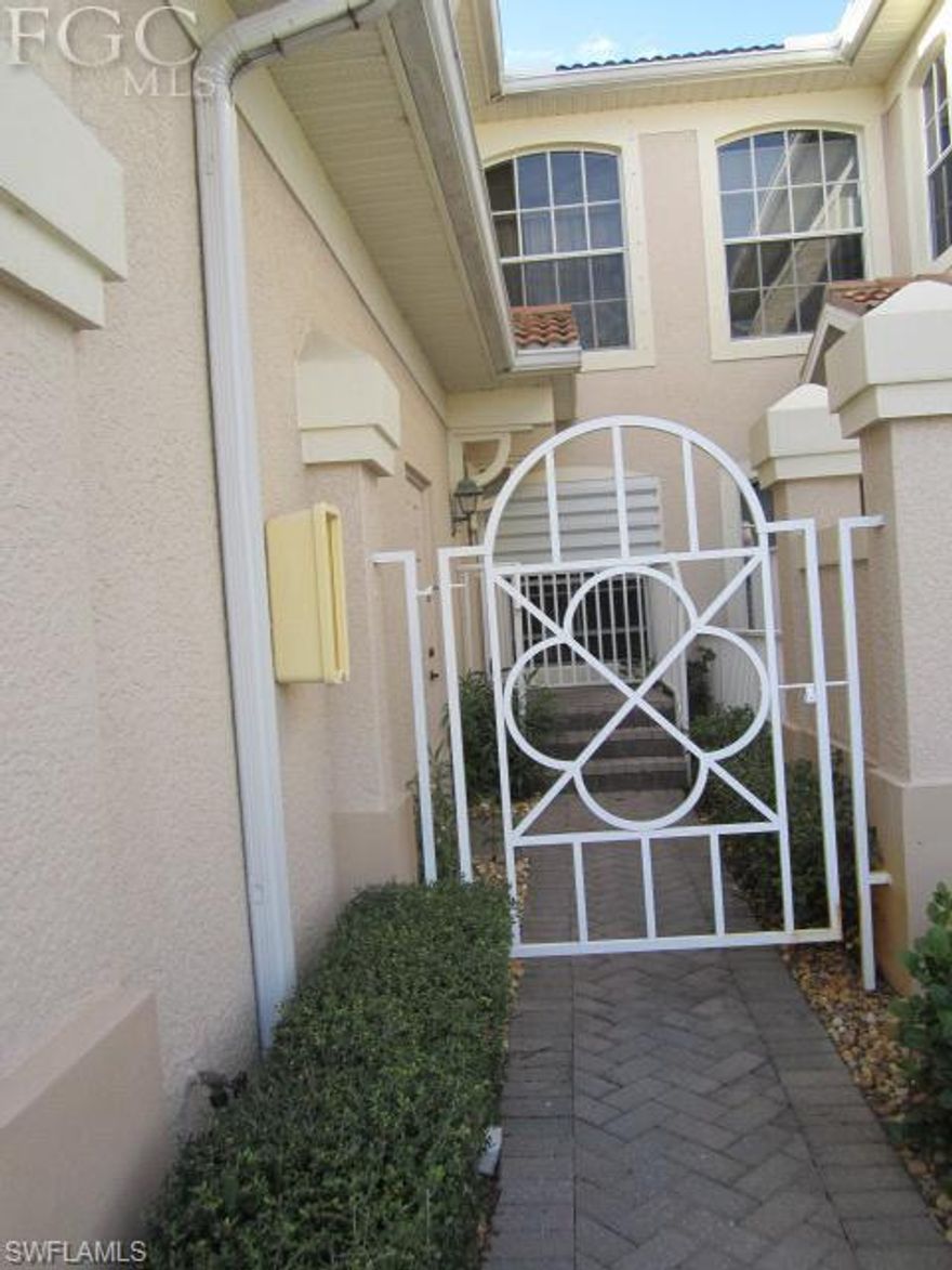 WOW THIS VIEW IS AMAZING!!!  Highly sought after Osprey Model (only one on the market) 18 tile on the diagonal, upgraded fans and lighting. Beautiful lam. wood stairs (easy to keep clean) Corian Counters, new handles on wood cabinet  dining area and a gathering room. Master suite with 2 walk in closets and large master bath with garden tub, shower and dual sinks. Large guest room with window seat and an attached bath. Ledges for decorating. BUNDLED GOLF!!! Plus all the amenities Colonial Country Club has to offer. Golf, Tennis, Restaurant with fine dining and entertainment on Thurs, night, full time social director, full time fitness director, state of the art exercise facility, community pool + resort style pool at the clubhouse. Close to restaurants, shopping, medical, Red Sox & Minnesota Twins Spring Training Facility. Close to SWFL International Airport. Come visit you won't want to leave.