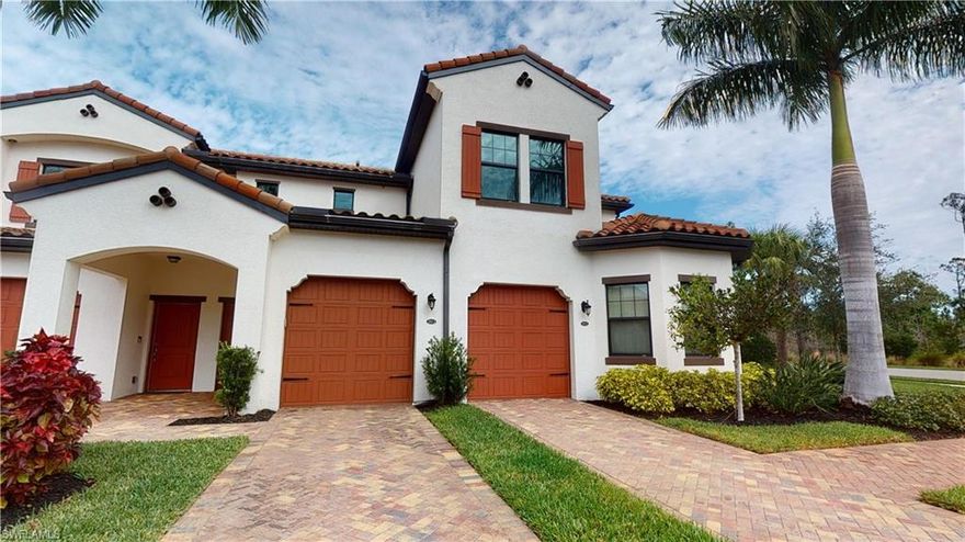 Step inside this beautiful carriage home second level floor plan in the desirable, gated community of Livingston Lakes. This quiet and peaceful corner unit offers both the lake view and the natural preserve from the screened in lanai.  The expansive sliding glass doors make you feel as though you have an additional tropical living area. Lots of natural light in all locations of this home.    Quartz countertops and backsplash, white cabinets with soft close, stainless steel appliances, neutral tile in main areas and neutral carpet in bedrooms. Ceiling to floor window treatments, Hunter Douglas up down blinds, huge walk in master closet and laundry area.  Two full bedrooms, 2 full bathrooms plus den with French doors, 1 car garage and extended longer paved driveway.  This property is a very well maintained, pet friendly community, with many amazing amentities.  Walking distance to Seed to Table and North Collier Regional Park . Minutes to the beaches, Mercato, Southwest Florida Airport and NCH Hospital and I-75.  Don’t miss this opportunity for luxury living in the center of North Naples.