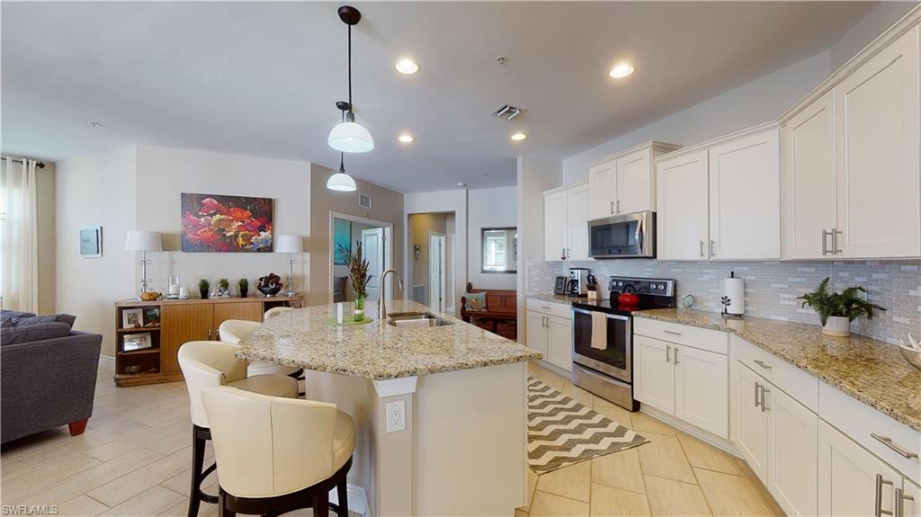 COACH HOMES AT LIVINGSTON LAKES - Residential