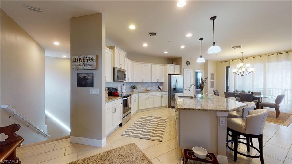 COACH HOMES AT LIVINGSTON LAKES - Residential