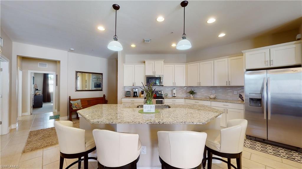 COACH HOMES AT LIVINGSTON LAKES - Residential