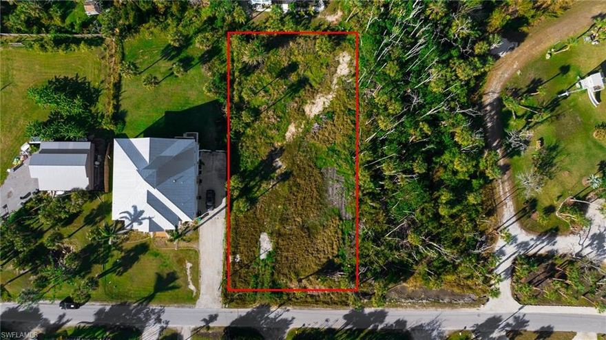 Build-ready, large lot in a prime a Fort Myers location near Sanibel with no bridge tolls! Access to City sewer, electricity and newly paved access road give you a great start on your new build.   A short distance to the future Calusa Grande shops & dining makes this an ideal location to live the Florida lifestyle you have dreamed. Bring your builder and make your vision a reality.