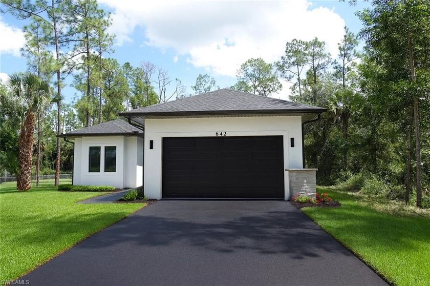 Beautiful 3 bedrooms plus an office with its own private entrance 1 story home, 3 full bathrooms, and a 2-car garage. This home is located 300 feet from the road, lots of privacy and landscaping to enjoy!! Exquisite tile flooring throughout. Modern kitchen island with a waterfall edge and electrical pop-ups, enhances the open-concept layout that offers a breathtaking view of the natural surroundings on 1.17 acres. Enjoy the convenience of a paved driveway, a screened lanai for outdoor leisure, and a reverse osmosis system for pure water. Ask about our buy down program.