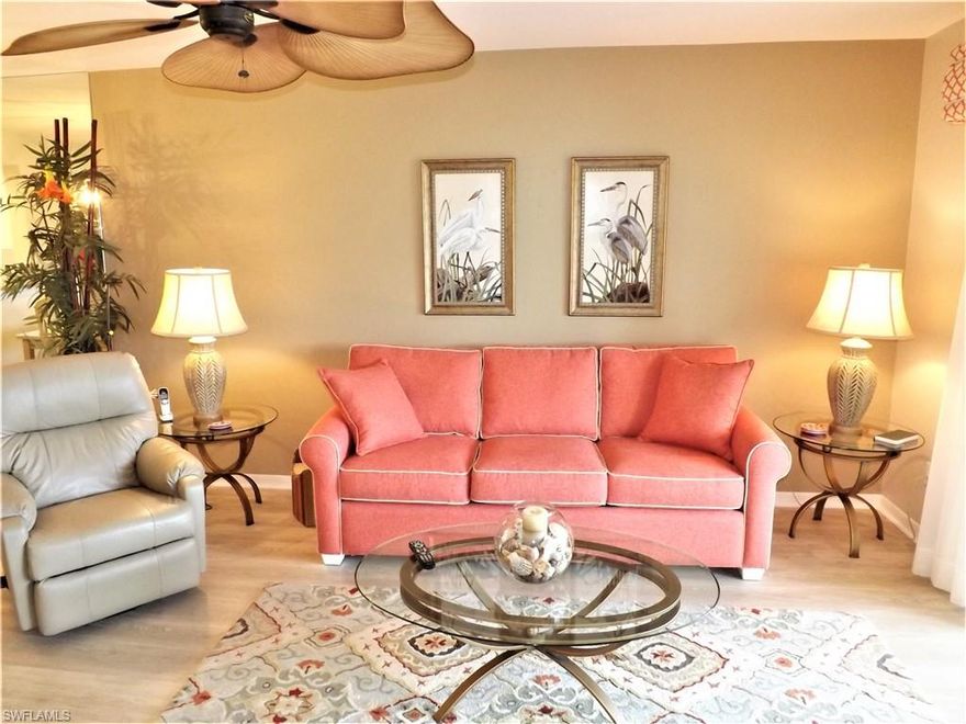 Make an offer!!!  SPECTACULAR “lakefront view from this turnkey, a move-in ready 1st-floor condo in the prestigious Kelly Greens Golf and Country Club community! This tastefully furnished and super clean 2 bed/2 bath unit is open, bright and ready for you and your suitcase. Highlights include updated kitchen, wood floors, neutral colors, 3x5 storage unit on both the lanai and carport, upgraded electric storm shutters, custom window coverings, tiled lanai, spacious walk-in master closet, carpet in bedroom and much more. The building was painted in 2019 and all condo assessments have been paid. Kelly Greens Golf and Country Club is one of the most desirable communities in SWFL! Kelly Greens is a fiscally sound, bundled golf community that includes a newly renovated Gordon Lewis Champion golf course, four Har-Tru tennis courts, updated full-service restaurant & grill and fitness center. The location is spectacular!!! Located minutes from Sanibel and Fort Myers beaches, Barbara B. Mann Center for the Performing Arts, shopping, hospital, dining and more.  Enjoy the fun & active lifestyle you deserve in a peaceful, serene setting!Call today for your private showing.