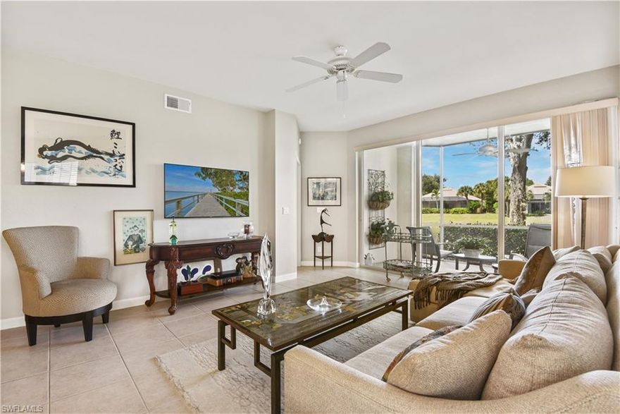 New Price Time to Make an OFFER! Owner says SELL! Premier Country Club living in Pelican Marsh! Situated in Ravenna a gated condominium community inside of Pelican Marsh that offers it's own community center with a lakefront pool & spa. This first floor lakefront home is ideal for both seasonal or annual SWFL living and features a screened front entry, 1-car garage, lots of windows allowing for the home to be filled with natural lighting, tile flooring in main living areas, a guest room with wood flooring & French door entry that is perfect for a den/home office, spacious kitchen w/ breakfast nook, and a screened rear lanai with offering a beautiful view of the lake. Recently updated-top-of-the-line fridge with transferable warranty, newer a/c unit, and an added butler area in kitchen with custom accent lighting. Pelican Marsh, located near the gorgeous beaches of the Gulf of Mexico, offers both a private membership golf club & a community center with activities for every member of the family. The community is known for it's fantastic Naples location and for having pristine & meticulously manicured grounds & lush tropical landscaping surrounding mature trees draped w/ Spanish moss.