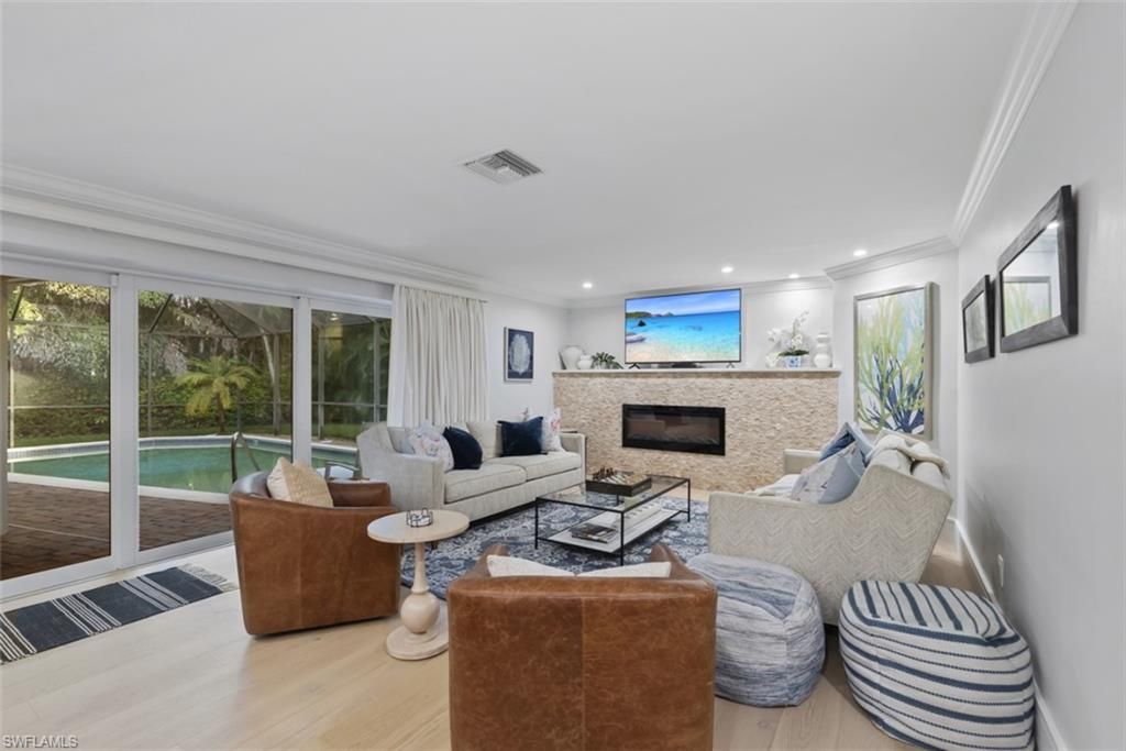 Photo of 635 Fountainhead LN, NAPLES, FL 34103 (MLS # 225078307)