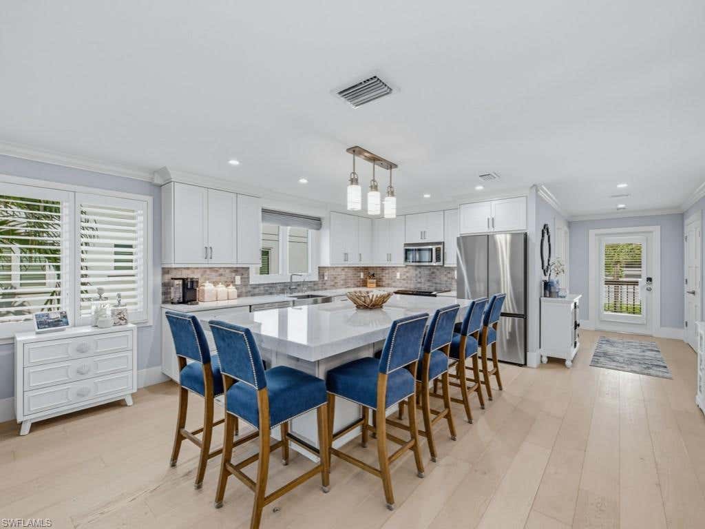 Photo of 225 5th AVE S #103, NAPLES, FL 34102 (MLS # 226021821)