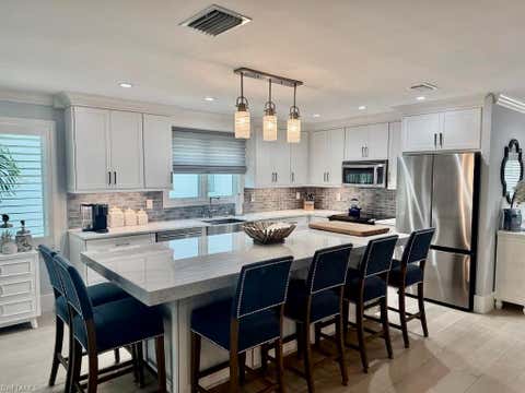 Photo of 225 5th AVE S #103, NAPLES, FL 34102 (MLS # 226021821)