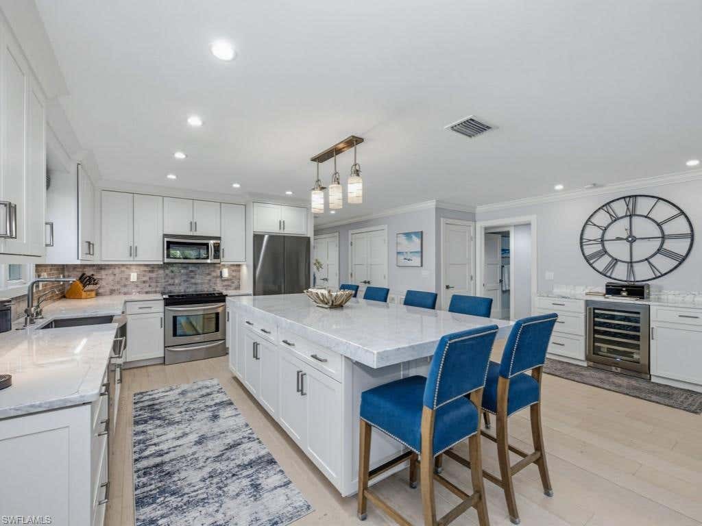 Photo of 225 5th AVE S #103, NAPLES, FL 34102 (MLS # 226021821)