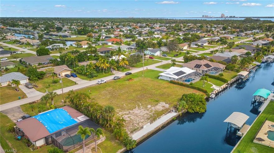 Waterfront Dream Lot for Boaters Priced to Sell

This is a rare opportunity to build your custom waterfront home on a prime gulf access lot in Southeast Cape Coral. With no bridges or locks, you can enjoy direct open water access from your brand new 2023 seawall and dock, reaching the Caloosahatchee River and the Gulf of Mexico in just minutes. This property delivers true boating freedom and exceptional value.

Southern exposure fills the future home site with natural light while providing beautiful water views and glowing skies throughout the day. Whether you own a yacht, fishing boat, or kayak, this lot is perfectly positioned for the ultimate Florida waterfront lifestyle.

Located within Cape Coral’s 400 plus miles of navigable canals, often referred to as America’s Waterfront Wonderland, adventure begins right outside your back door. The setting is peaceful yet convenient, with easy access to shopping, dining, and the Midpoint Bridge for quick trips into Fort Myers.

Priced to sell, this deep water gulf access lot offers an outstanding blend of location, lifestyle, and value. Opportunities like this are increasingly rare. Secure your waterfront dream today. No owls.