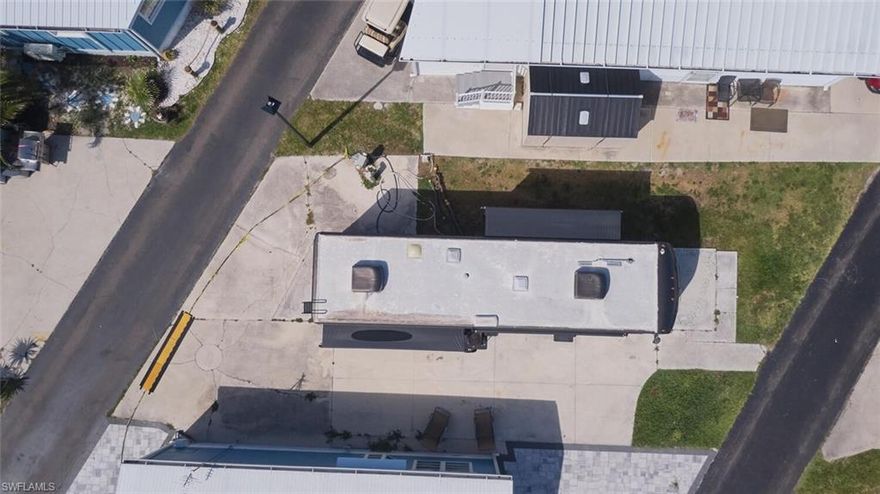 PRICE REDUCED!  Here's your chance to OWN your lot within three miles of Fort Myers Beach in Holiday Condo where you can choose if you want a manufactured home or an RV on your lot.  The low HOA fee of $157 month includes water, sewer, lawncare, and trash pickup along with all of the amenities including an indoor and outdoor pool, spa, sauna, bocce ball, tennis courts, shuffleboard, horseshoes, library, laundry onsite, clubhouse, game room, and a gated entry.  This is NOT an age-restricted community and it's pet friendly.  It's also a great investment rental option with no minimum amount of days for rental (maximum days 6 months).