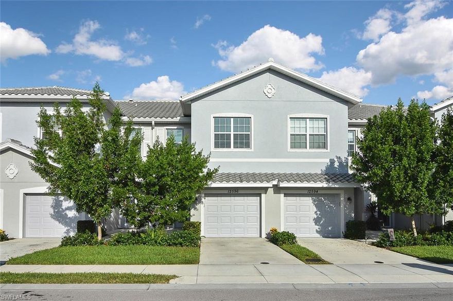 Location. Location! LOCATION!! This almost brand new townhome is located in the highly sought after Westhaven community which is part of GATEWAY GREENS!! The kitchen has granite countertops, 42" wood cabinets and stainless steel appliances. The stairs and 2nd floor have been upgraded to commercial grade waterproof vinyl plank flooring (a $7,400 upgrade) and the master suite and living area have crown molding. Downstairs has a large open living area and a relaxing view of the backyards lush landscaping. The kitchen has an incredible amount of cabinet space and there's a large pantry too. The master bedroom upstairs is HUGE! The master bath has his and hers sinks, his and hers walk-in closets, a glass shower and a separate water closet. Both spare bedrooms are generous in size and have walk-in closets too. The guest bathroom provides a large counter top, shower/tub combo and plenty of storage space. Loads of sunlight is soaked up from the generous sized windows and for your convenience the laundry room is located upstairs. Gateway offers over 15 miles of walking/biking trails and local hang out spots such as Saucy Meatball, Fort Myers Brewery, Skinny Dogz, Scoop Me Up Ice Cream, etc.