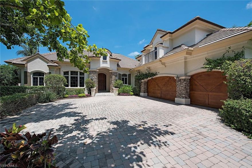 Enjoy casual elegance and entertaining in this timeless Port Royal home that promotes tropical living. Sited close to the beach club, this fine residence of over 7,200 total square footage features bright interiors with walls of French doors that foster in light and views of the verdant landscaping. A split floor plan promotes privacy and functionality with a separate master wing, study outfitted with beautiful wood floors and built-ins, two additional guest en-suites and a separate cabana, allowing ample space for family and guests. A marble fireplace and wine closet flank the living room and enhance the gathering area while the formal dining area designates the spot for those special occasions. The open kitchen is equipped with top-tier appliances and connects to the family room which spills out to the covered patio and outdoor space featuring a summer kitchen, gas fireplace, spectacular pool, and spa. This luxurious estate celebrates resort living while providing all the amenities of privacy and beauty in a prime location.