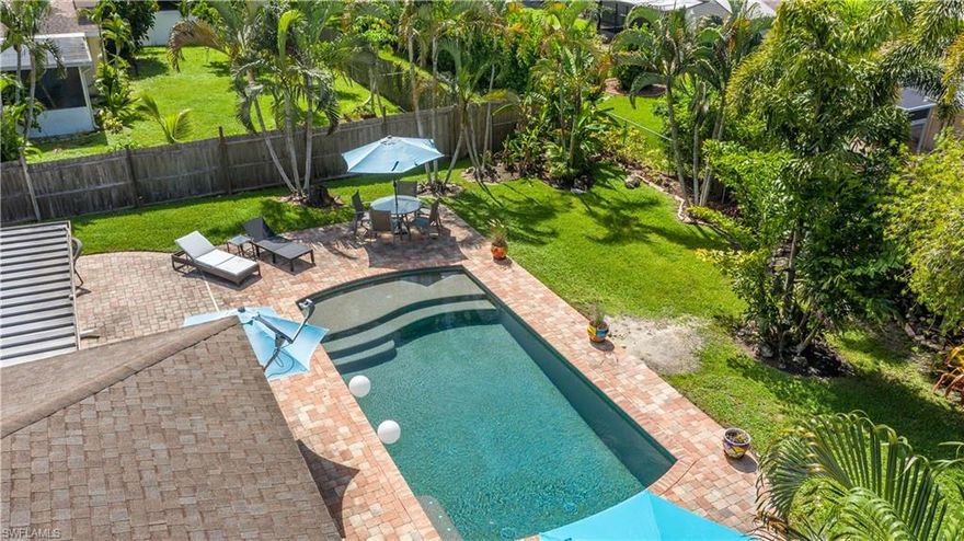 OFFERS WILL BE ACCEPTED UNTIL THIS FRIDAY OCTOBER 28 AT 6PM. Hurricane update: This property got 5 feet of water during Ian.  Home will be sold AS-IS Cash Only at Land Value.  West of 41 (Check) PRIVATE Community Boat Ramp (Check) Fenced (Check) Brand New Custom Pool (Check)   Close to A-Rated Schools (Check) Beautiful Hardwood Floors (Check) Updated Master Bath (Check) This Cozy Home is Waiting for a New Family to Love!  The Custom Pool Features A Sun Shelf, Bubblers, Salt Water is Heated and Oversized!  A Split Floor Plan offering 3 Bedrooms, 2 Living Spaces and a HUGE Outdoor Space w/ Lush Landscape!  Island Park Woodlands is a Very Desirable Community w/ Easy Access to I-75, 41, FGCU, RSW International Airport, A Rated Schools and THE OPEN GULF WATER!