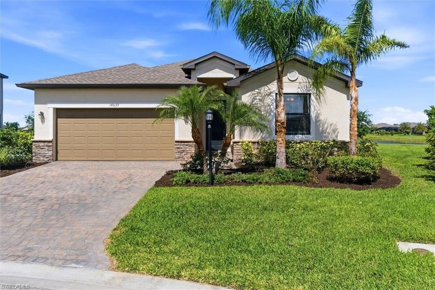 THIS HOME IS A SHOW STOPPER!!!!  HUGE OVERSIZED PIE SHAPED HOME SITE LOCATED IN A CUL-DE-SAC WITH INTERSECTING LAKE VIEWS!!!!!!   This Trevi Model features 4 Bedrooms, 3 Baths, Crown Molding, Granite Counters, Stainless Steel Appliances, Stone Backsplash in Kitchen, Wood Cabinets, Epoxy Painted Garage Floor, Pest Control System built in the Walls!!!!  Home has been recently painted on the interior.  ALL TILE FLOORS in the main living area.  BRAND NEW UPGRADED CARPET IN ALL BEDROOMS!!!!  Wood Decor Designed Accent Walls -- Relax on your Screened Lanai and take in the Beautiful Intersecting Lake Views.  This home has a Large Pie-Shaped Home Site providing a LARGE Back Yard and located in a Cul-de-Sac which provides less traffic.   SELLER IS MOTIVATED AND OPEN TO ALL REASONABLE OFFERS!!!  THIS HOME PROBABLY WILL NOT LAST LONG --- COME SEE IT TODAY!!!