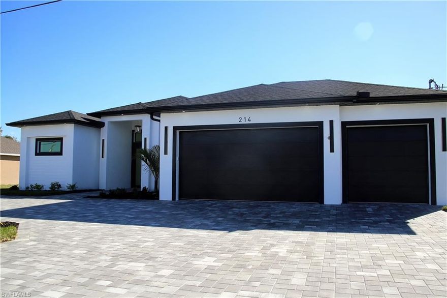 Triple Oversized Lot, 4-bedroom, 3-bathroom home offers a perfect blend of modern design, elegance, and functionality. Open Concept kitchen features luxury cabinetry and Quartz countertops, providing both sophistication and durability—ideal for everyday living and entertaining. High Impact doors and windows, all bathrooms feature glass doors, modern showers and beautiful stones flooring. The home is enhanced by high-end designer light fixtures that add warmth and elegance throughout the living spaces. It also includes a dedicated laundry room equipped with its own sink and custom cabinets, offering convenience and organization. The spacious closets stand out with custom carpentry work, including built-in drawers, maximizing storage while showcasing fine craftsmanship. Overall, this is a bright, modern property with an excellent layout, perfect for those seeking comfort, style, and luxury details in their new home. This property is conveniently located near hospitals, schools, shopping centers, and markets, and just minutes from Sun Splash Water Park in Cape Coral. It features city water, and all Assessments are fully PAID, offering great value and peace of mind. No HOA, NOT FLOOD ZONE .