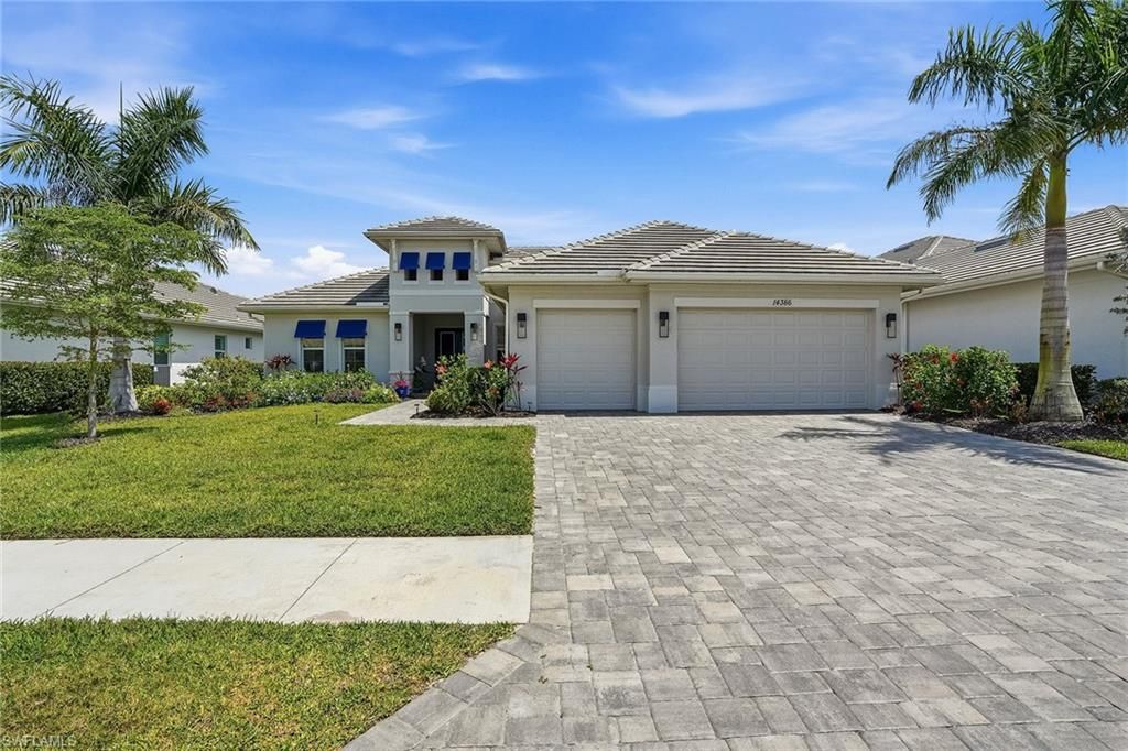 Photo of 14386 Laguna Springs LN, NAPLES, FL 34114 (MLS # 226013703)