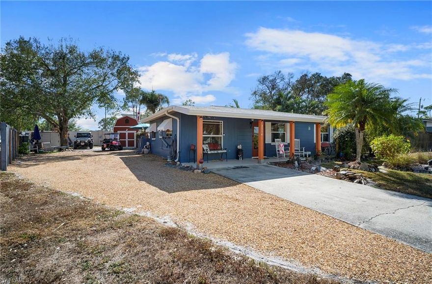 This North Fort Myers home has it all.  Well maintained, this home is about 10 minutes from I-75, about 10 minutes from DT Ft. Myers, and you can get to the nearby Publix & Walgreens!  The home features: stainless steel appliances and a tankless hot water system too.  The bathroom was very recently renovated by ReBath.  The Key West style back yard is just the spot for relaxation and entertainment.  It features a pool with cabana, outdoor kitchen with running water & bar and grill.  The large mini-barn has plenty of extra storage and work shop with a side retractable awning.  There's an additional large shed for your tools & lawn equipment.  Notable feature: the golf cart is an approximately 3 y.o. gasser and is included with the sale.