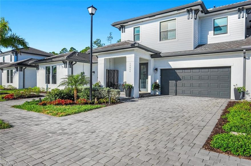 Fantastic Location meets beautifully upgraded unit for a perfect match!  This Daphne floor plan at Parkway Preserve features 2,209 sq ft under air and upgrades galore, including: Timberlux LVP flooring throughout with upgraded 20" porcelain tile in the bathrooms, upgraded Quartz throughout, Soft Close cabinets and drawers, Upgraded Appliance package. Extended and Screened Lanai, Plantation Shutters, Motorized Zebra Shades on Sliders, Aqua Systems R/O and Performance Water Systems, Frameless Glass shower enclosure in Primary bath, all on a quiet lot with a private wooded rear yard.  Parkway Preserve features beautiful amenities including a community pool and spa, well equipped fitness room and a gorgeous clubhouse.  Convenient to everything you need - RSW, I-75, Bell Tower Shops, Gulf Coast Town Center and the beaches!