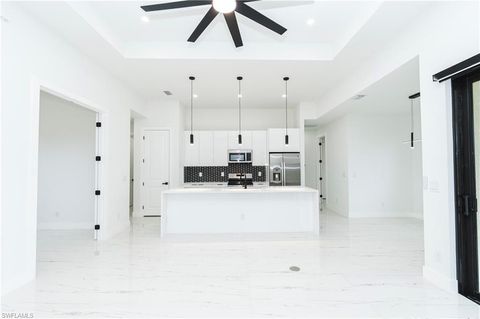 Photo of 903 NE 23rd ST, CAPE CORAL, FL 33909 (MLS # 2025018313)