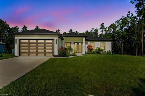 Photo of 824 Grenada AVE, LEHIGH ACRES, FL 33974 (MLS # 2025019824)