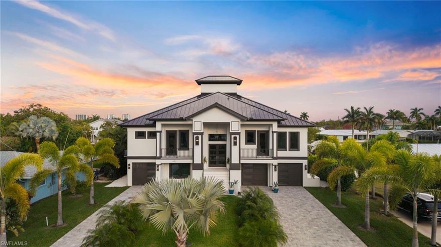 PREPARE TO BE AMAZED! Brand New LUXURY Waterfront Estate | BOATERS PARADISE!  Direct Gulf Access | 40,000-LB Lift | Designer Furnished Stunning home!
An exceptional opportunity to own a brand-new construction waterfront estate in the charming highly sought-after Isles of Capri, where luxury living meets effortless access to the Gulf.
This professionally designed and furnished residence offers five spacious bedrooms plus a den, four full bathrooms, and a three-car garage. Thoughtfully crafted with a bright, open-concept layout, the home is filled with natural light through expansive glass sliding doors that seamlessly connect the indoor living spaces with the outdoor waterfront setting. A striking fireplace anchors the main living area, creating an inviting yet sophisticated gathering space. Stunning designer chandeliers and light fixtures will impress even the pickiest buyers. Beautiful wood floors. 
The chef’s kitchen is both beautiful and functional, featuring an oversized island, quartz countertops, gas cooktop with pot filler, walk-in pantry, dual wine coolers, and a full suite of premium Thermador appliances—perfect for entertaining or everyday living.
The spacious primary suite offers a private retreat with direct access to an expansive balcony shared with the main living area, where you can take in tranquil water views and coastal breezes. His and her closets with built ins will keep you organized. Lower level features a huge family room with a sitting area, perfect for wine tastings or cocktails, a full-size bathroom, large bedroom and a flex room that can serve as another bedroom, den or storage room. 
Luxury outdoor living features a large, heated saltwater pool with elegant water features, gas fire bowls, and a relaxing spa—creating a stunning backdrop for both quiet evenings and vibrant gatherings. Huge screened in lanai (no-see-um screens) with covered and uncovered areas, and spectacular outdoor kitchen with a large island. Impact windows and doors, metal roof, paver driveway, designer landscaping.
For boating enthusiasts, the property delivers direct Gulf access and an impressive new dock equipped with a 40,000-lb boat lift, water, electricity, and a fish cleaning station—making it effortless to enjoy days on the water.
Beautifully furnished, professionally decorated, and ideally positioned in one of Southwest Florida’s most unique waterfront communities, this remarkable residence represents the very best of luxury coastal living. Nestled along Florida’s Gulf Coast, Isles of Capri is a charming subtropical island known for its natural beauty, abundant wildlife, and relaxed coastal lifestyle. Residents enjoy a paddle and kayak park, scenic walking and jogging paths, a community park with bocce courts, four popular waterfront restaurants, and three full-service marinas. Ideally located just one mile from Marco Island and approximately 15–20 minutes from the shopping, dining, and cultural attractions of Downtown Naples.