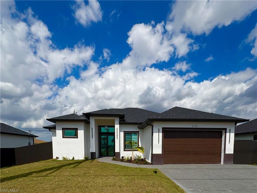 Welcome to Your Dream Home in the Heart of Cape Coral! Step into luxury with this stunning 4-bedroom, 
3-bathroom pool home offering 1,735 sq. ft. of beautifully designed living space. Located in a prime Cape Coral neighborhood, this home is packed with high-end features and modern elegance. Inside, you’ll find an open-concept layout with sleek porcelain tile flooring throughout, complemented by designer finishes and high ceilings with a tray accent in the living room and master suite. The spacious kitchen is a chef’s dream, featuring quartz countertops, stainless steel appliances, a large island ideal for entertaining, and ample storage.The luxurious master suite boasts two custom-designed walk-in closets, dual vanities, a linen closet, and private access to the pool area. All bathrooms are tastefully finished, and the entire home is fitted with hurricane impact-resistant windows and doors for your peace of mind.Step outside to your private oasis—an all-fenced backyard with a beautiful pool and a covered lanai, perfect for soaking up the Florida sunshine, relaxing in privacy, or hosting family and friends. There’s plenty of space for kids to play or pets to roam freely. Additional highlights include city water with assessment paid, the significant benefit of being outside of a flood zone—meaning no flood insurance required. Convenience abounds with nearby supermarkets, shopping centers, and top dining destinations just minutes away. Don’t miss your chance to own this slice of paradise—schedule your private showing today!