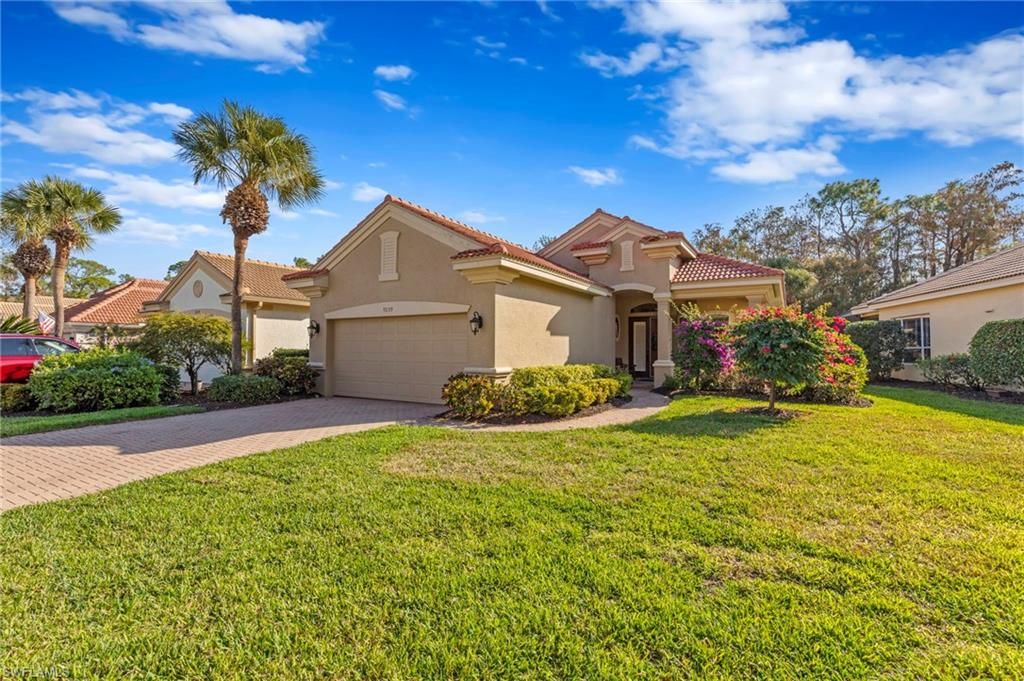 Photo of 9230 Troon Lakes DR, NAPLES, FL 34109 (MLS # 226002248)
