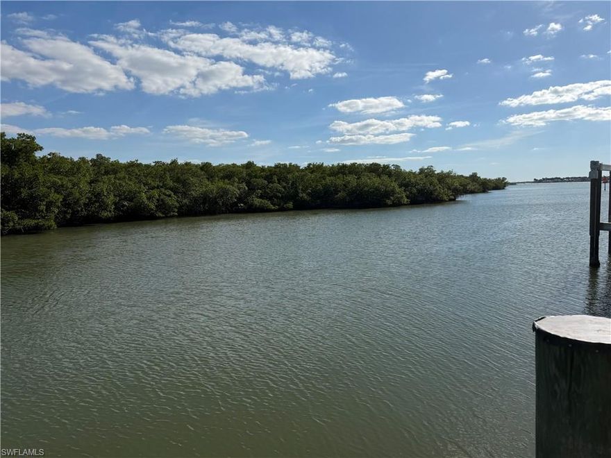 WATERFRONT LUXURY IN THE HEART OF NAPLES. This exceptional waterfront residence in Royal Harbor is truly a boater's dream. situated along the Intercoastal Waterway. With complete privacy. This home is ideal for those seeking to renovate, expand or design a new custom home in a premier setting. The property features a 100-foort seawall and an 80-foot private dock, offering direct access to the Bay and ideal accommodation for a large vessel. The location is equally impressive-just 2.5 miles from the white-sandy beaches of Naples and Fifth Avenue South, World class dinning, shopping and entertainment within minutes. Combining premier boating access, stunning views, and  proximity to downtown Naples, this property offers the ultimate waterfront lifestyle.