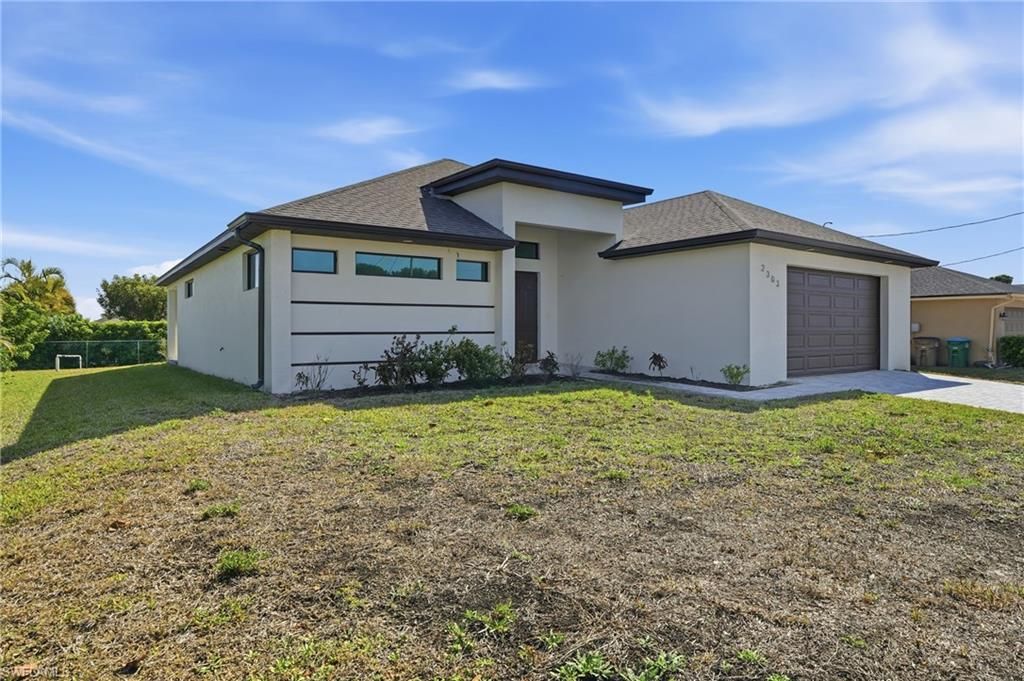 Photo of 2303 NW 18th PL, CAPE CORAL, FL 33993 (MLS # 226017955)
