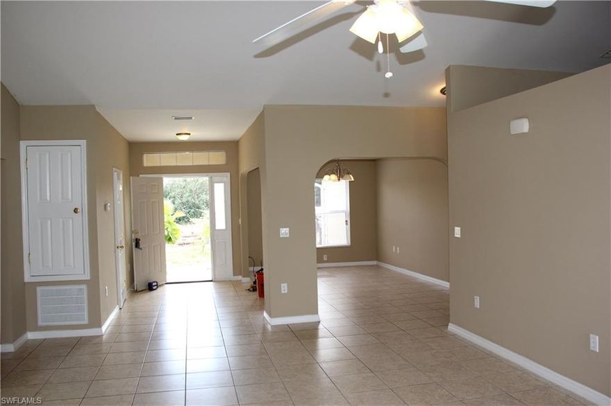 Need Space?  HUGE 4 Bedroom 3 Bath Single Family Home with Den or Formal Dining Room.  Solidly Built Concrete Block Home with plenty of room for a growing family.  Want a great deal?  This home is $100,000 less than original purchase price brand new in 2005.  Open Floor Plan with lot's of room to spread out and soaring vaulted ceilings.