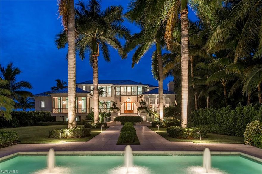 Unlike any other shorefront home, this captivating beachfront estate is the ultimate retreat. Situated on over two acres, this Caribbean-style manor home offers over 200 feet of Gulf frontage and soft sand beaches. The lushly landscaped grounds beckon residents and guests to the serenity of island life, as the soothing sounds of waves whisper throughout nearly every room. This spectacular property features breathtaking views of the Gulf from nearly every room and includes two family rooms, a study, master suite with spa retreat, spacious media and fitness rooms, two-story guest house with two fully-equipped guest suites, and freestanding garage with two bays (in addition to the main house parking bays), gazebo for seaside meditation or contemplation of the koi pond, and a saltwater pool and spa surrounded by a multilevel, coquina-stone lanai. *See listing agent for appropriate disclosures regarding square footage*