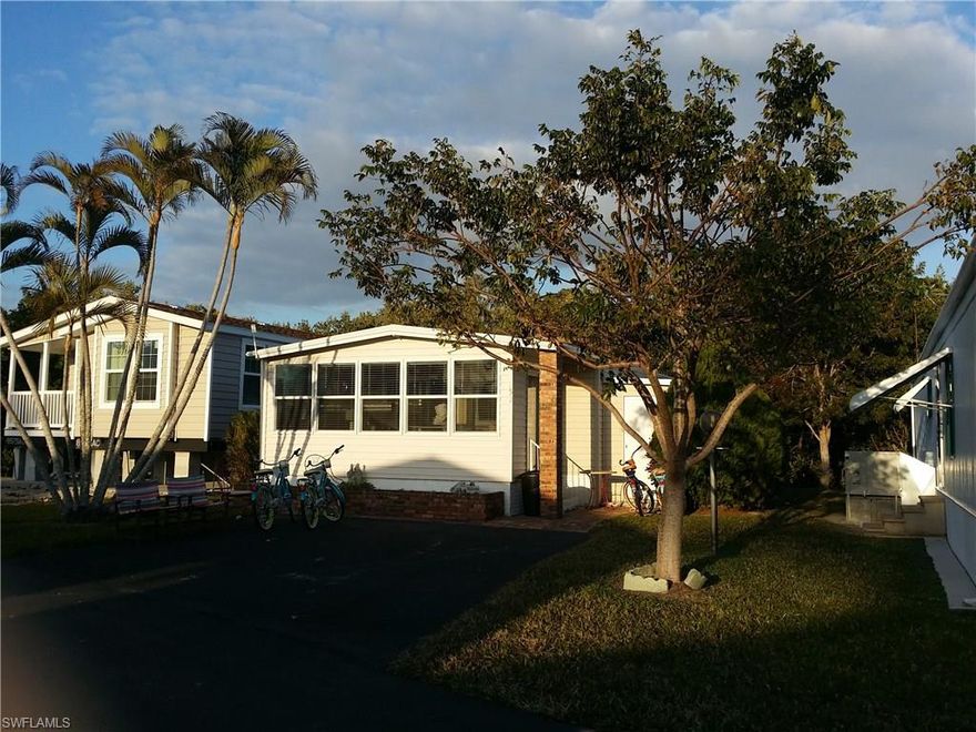 THIS IS THE LOWEST PRICED HOME IN THE PORT CARLOS COVE 55+ MANUFACTURED HOME WATERFRONT COMMUNITY. PRICED TO SELL QUICKLY AND FULLY REMODELED BETWEEN 2012 AND 2014.  IMPROVEMENTS INCLUDE A NEW ROOF, AIR CONDITIONING, WINDOWS, APPLIANCES, KITCHEN CABINETS, NEW FLOORING AND A NEW ATTACHED FLORIDA ROOM.  THIS PROPERTY IS LOCATED IN A VERY PRIVATE SETTING WITH THE ONLY BACKYARD NEIGHBORS BEING THE WOODS BETWEEN YOU AND ESTERO BAY.  DIRECTLY ACROSS THE STREET IS A BOAT LAUNCH RAMP WHICH LEADS TO ESTERO BAY, FORT MYERS BEACH AND THE GULF OF MEXICO.  IN ADDITION, YOU CAN ENJOY ALL THE AMENITIES OF PORT CARLOS COVE, WHICH INCLUDES A LARGE HEATED POOL AND A COMMUNITY CLUBHOUSE.