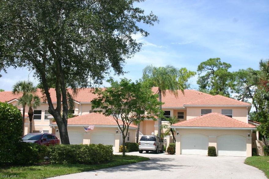 Escape to one of Naples best kept secrets and unwind in this beautiful carriage home nestled in the quaint golf course community of Emerald Greens, with beautiful tree lined streets and mature tropical landscaping.  Great location off Pine Ridge Rd. Stroll to grocery stores and major retailers.  Just a short drive to upscale shopping, dining, I-75 and the Beaches!  Unique upstairs 2 bedroom, 2 bath residence is move in ready and features gorgeous custom glass block and mirrored walls, plantation shutters, new neutral paint and carpet. Bright, open floorplan offers over 1300SF of living area w/vaulted ceilings, large eat in kitchen, breakfast bar, built-in desk, pantry & above cabinet lighting. You'll love the view on the roomy screened lanai overlooking Quail Run golf course. Large master suite with sliders to the lanai, custom mirrors, walk in closet, dual sinks and oversized soaking tub.  Inviting private bricked courtyard entry perfect for outdoor grilling. Pet friendly community with 2 small animals welcome, very low quarterly fees and taxes.  Great amenities including clubhouse, pool, spa & tennis courts. Lowest priced unit in Emerald Greens!