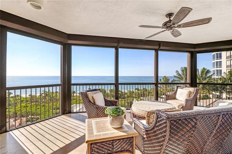 C.16830 - Masterfully remodeled and beautifully furnished end-unit condo located in prestigious Biltmore in Bay Colony. Enjoy stunning gulf views and endless sunsets from this 5th floor residence. This well appointed residence is designed to offer a relaxing coastal ambiance throughout, complemented by soft white-blue toned furnishings, set off by stunning wood flooring throughout the living areas, crown molding, and recessed lighting. The Grand Salon offers custom wall built-ins, tray ceilings, recessed lighting, wet bar all looking out to the amazing backdrop of the Gulf of Mexico.  Reformatted open floor plan allows you to flow with ease through the main living areas and in to your delightful chef's kitchen. This well thought out kitchen boasts huge center island, glass cook top, marble counter tops, custom-crafted cabinets, refrigerator, pantry, built-in wall oven and microwave. Your very own wine cooler to store your favorite wine comes with two refrigerated drawers. This split floor plan is designed with the master facing the Gulf. Two guest en-suites bedrooms with private baths offering a shared screened-in lanai. Relax by the resort-style pool with your own private cabana.